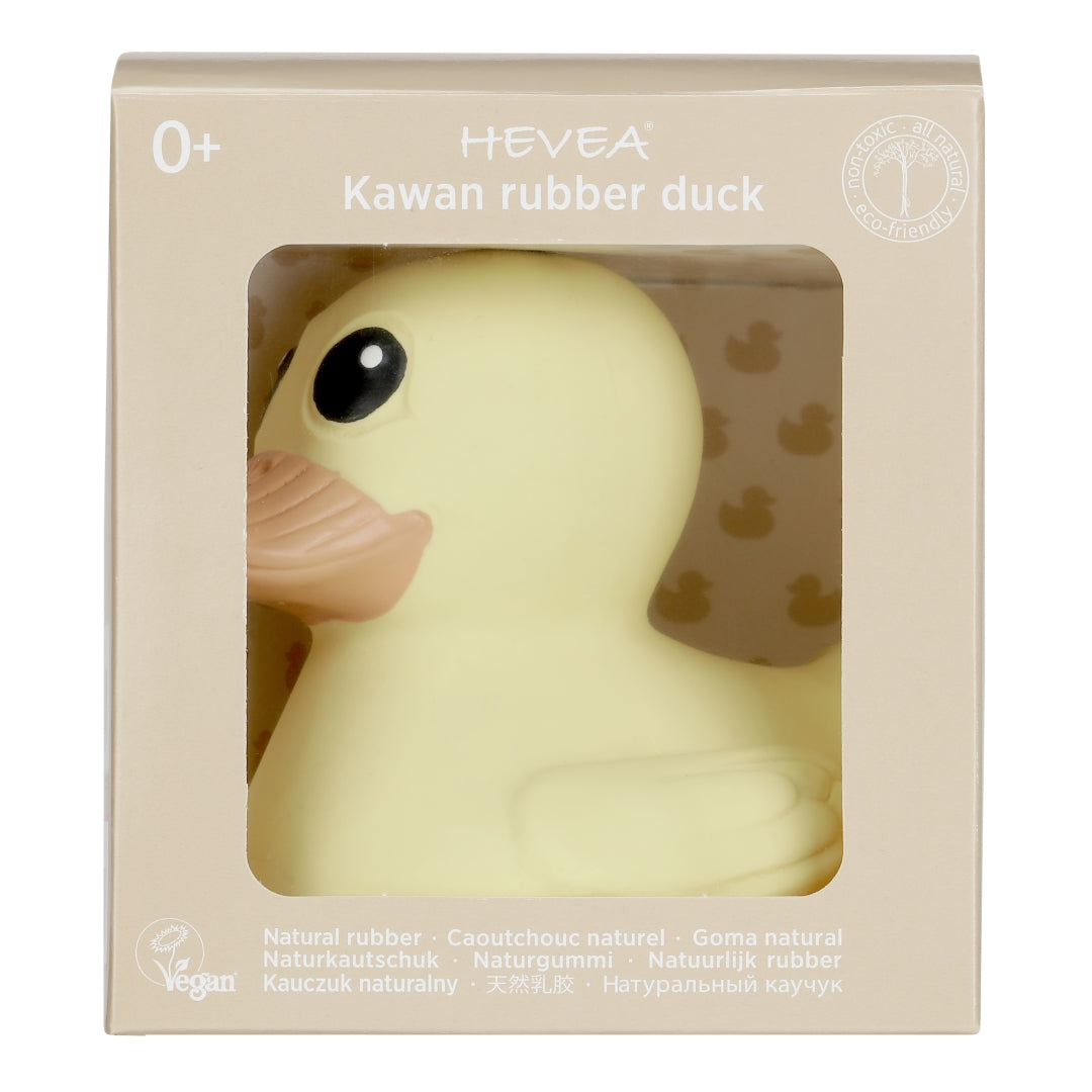 Yellow rubber duck in a HEVEA packaging on a white background