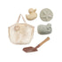 Set of bath toys including a duck, starfish, whale, and a shovel in a mesh bag on a white background.